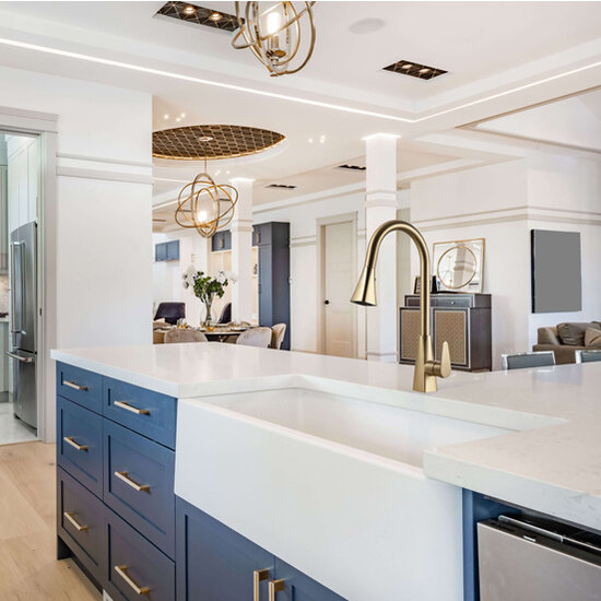 Houzer Catori Series Single Handle Pull-Out Kitchen Faucet, Brushed Brass In Use Kitchen View